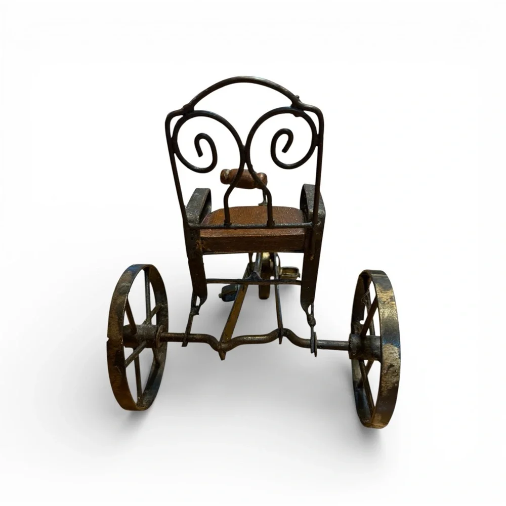 Vintage or antique-style miniature tricycle. “Salesman sample”